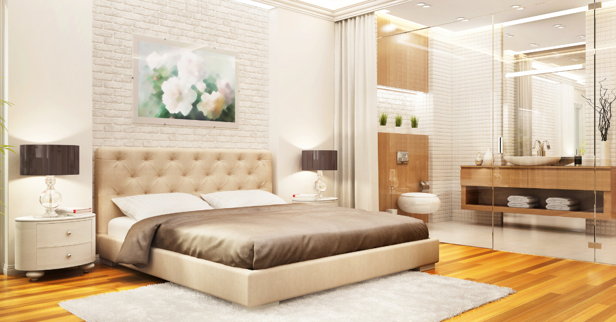 Modern bedroom interior with sage green and cream two-color wall combination for a calming effect.