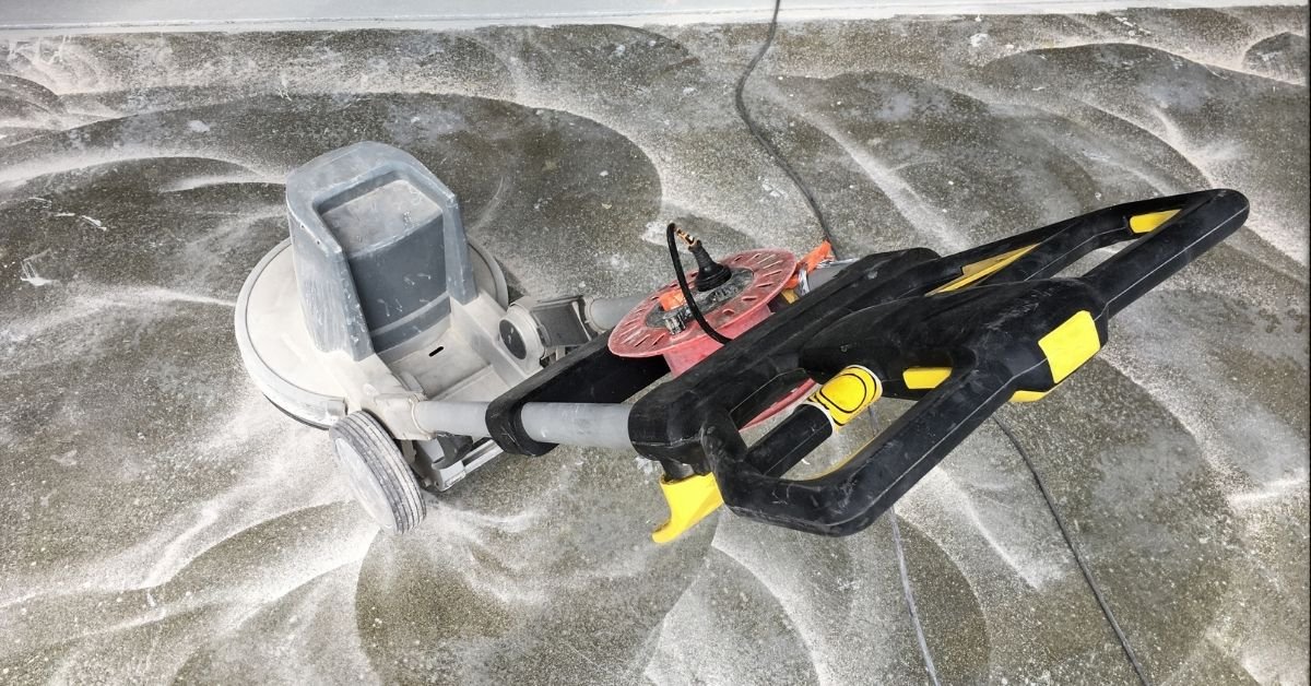Tools like wire brushes, chisels, and grinders used for surface preparation in concrete repair